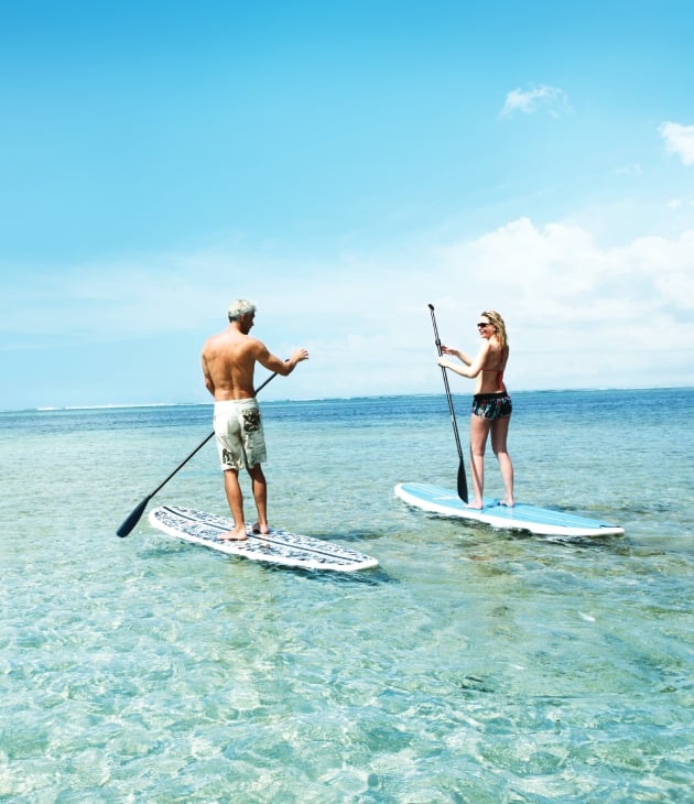 Couple on Stand Up Activity at Heritage Resorts Mauritius