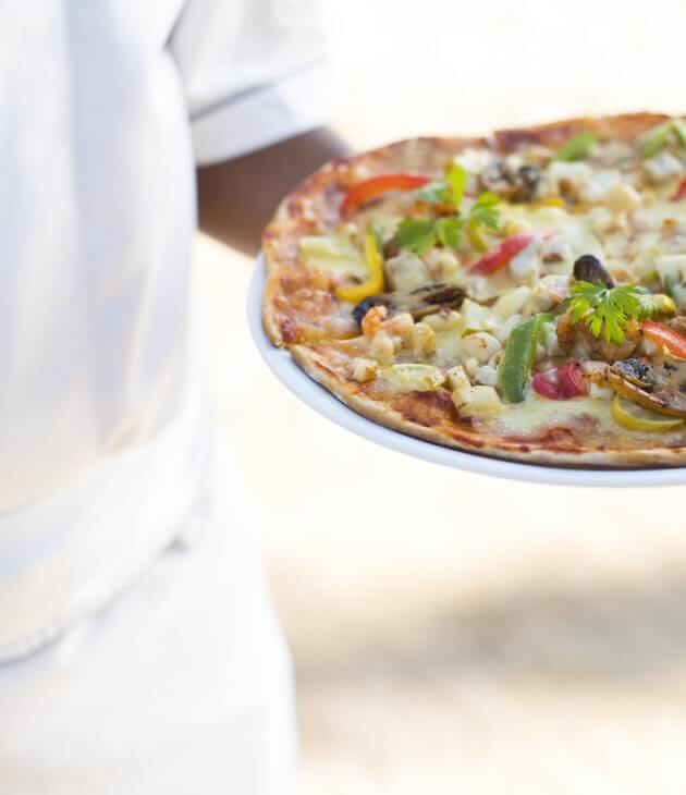 enjoy a pizza at the c beach-club