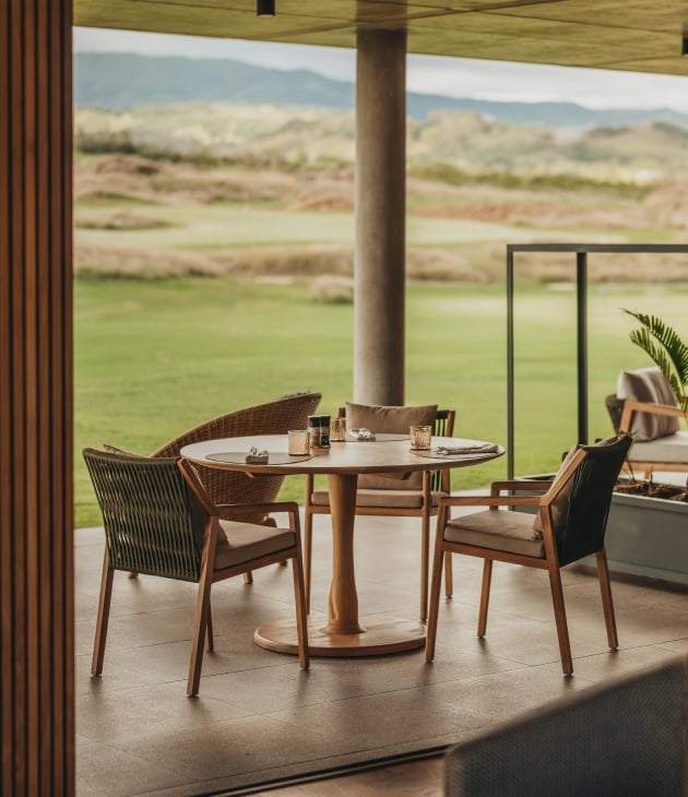 dinning table with view at la reserve golf link clubhouse