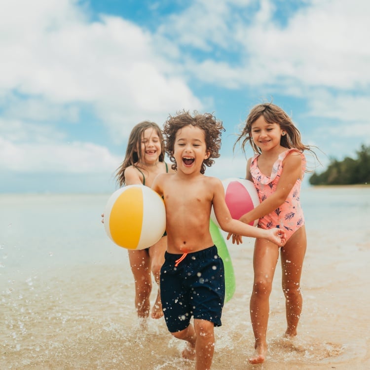beachgoer mauritius - heritage resorts