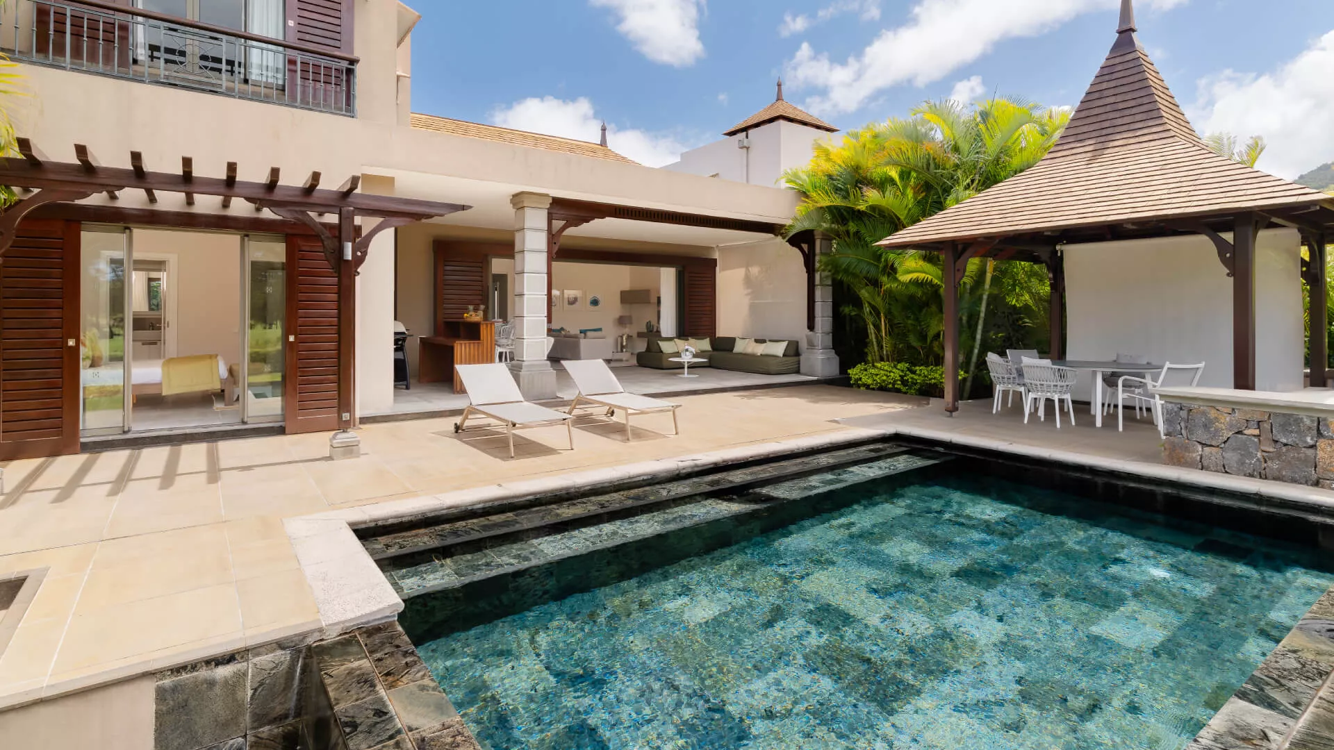 Close-up of 3 bedroom villa exterior with pool view