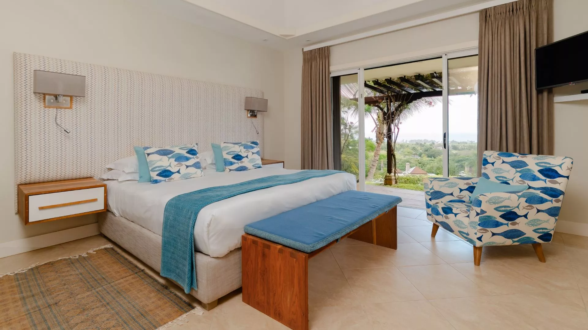 Side view of a bedroom in a luxury 4-bedroom villa with exterior view