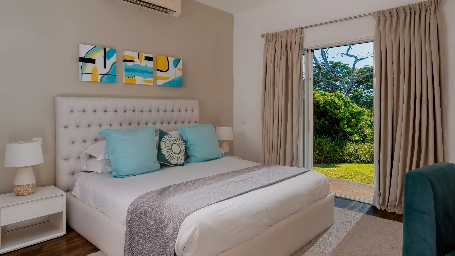 Ground floor bedroom in a four-bedroom villa with modern architectural details