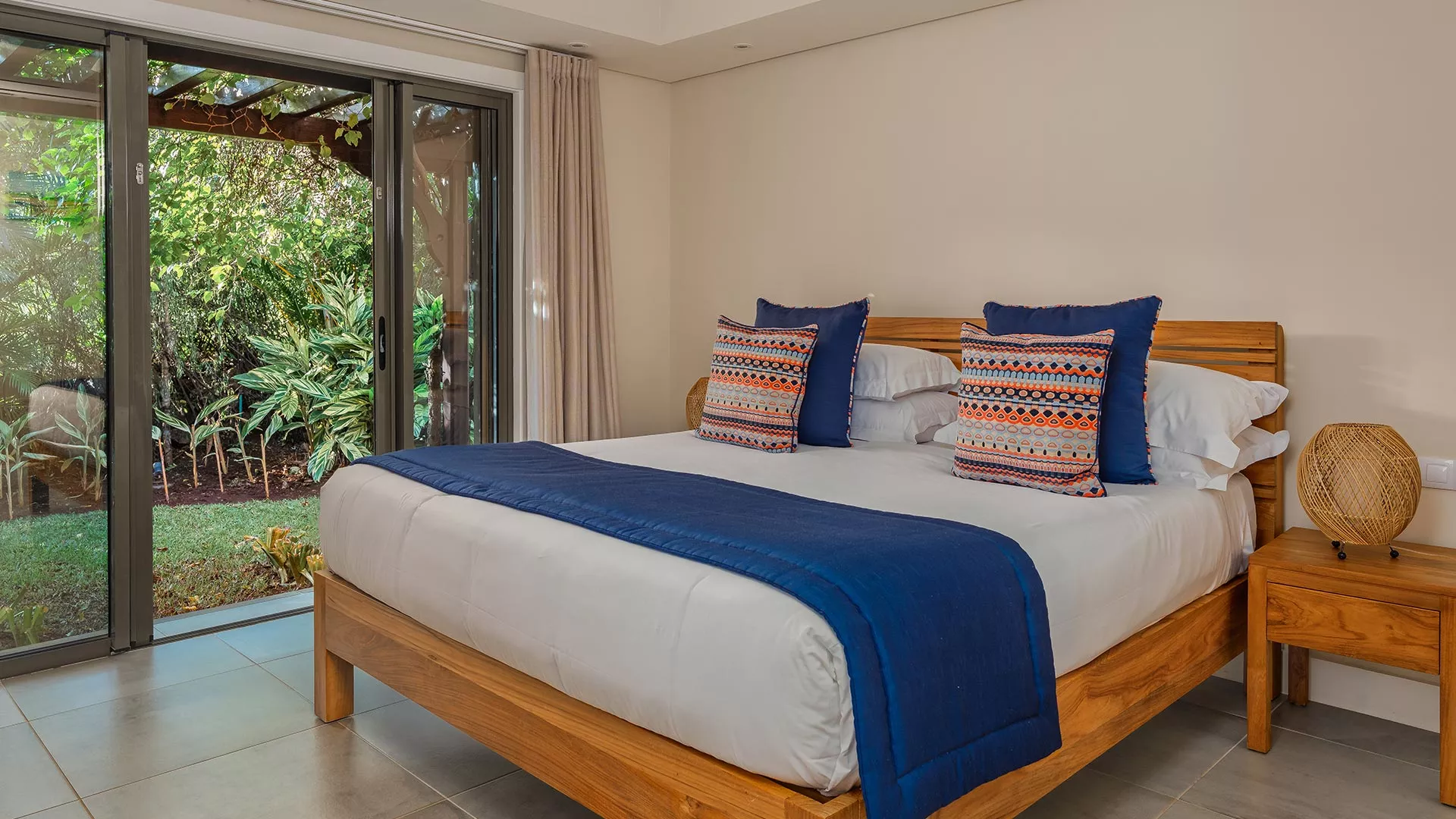 Third bedroom of a 4-bedroom villa with pool view at Heritage The Villas, Mauritius