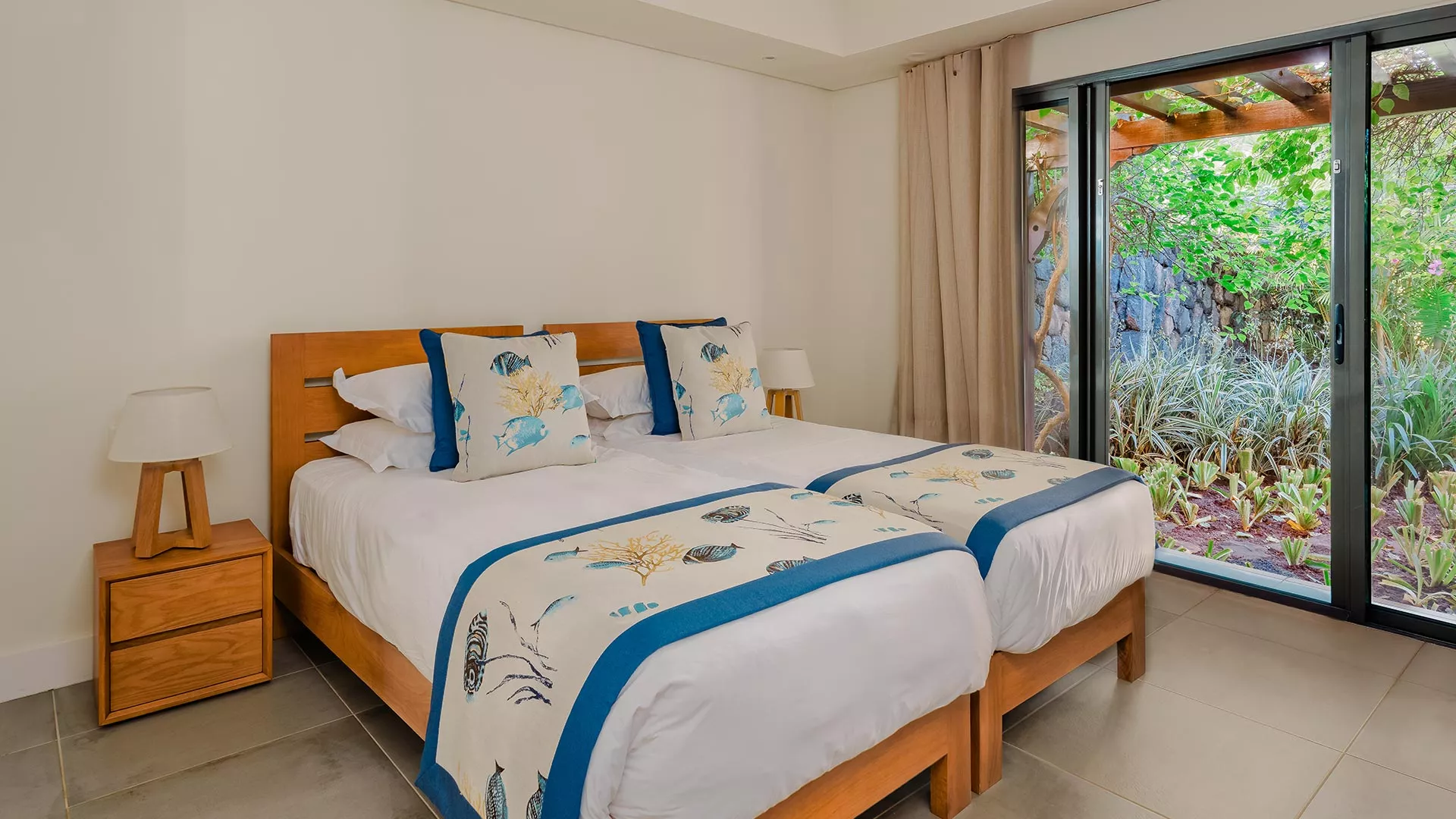 Fourth bedroom of a 4-bedroom villa with pool view at Heritage The Villas, Mauritius