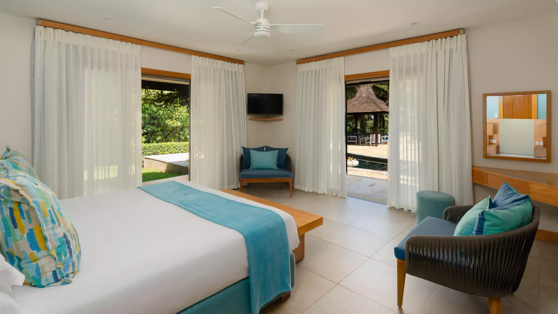 Bedroom in a luxury 3-bedroom villa with outdoor view