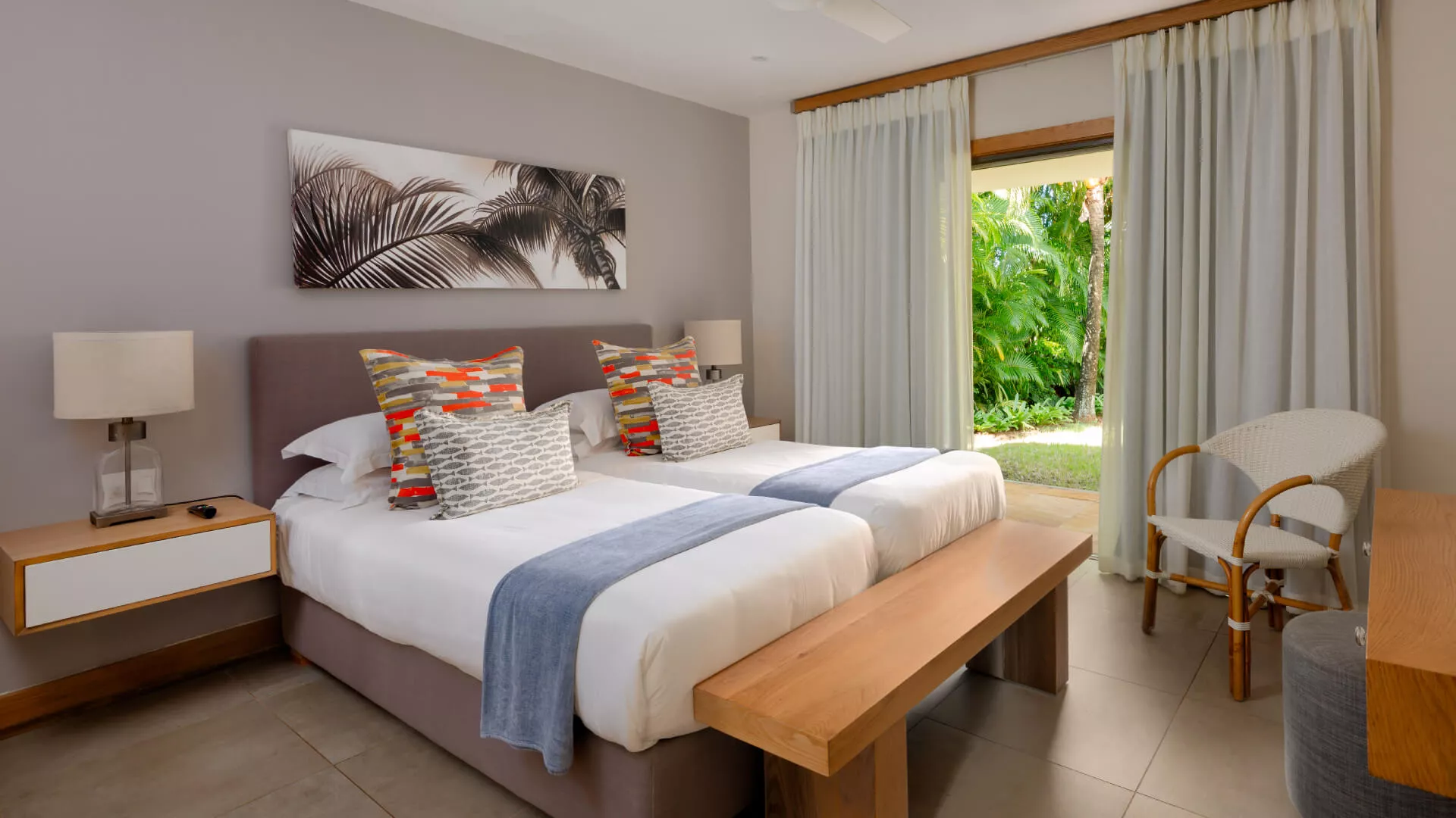Side view of a paired bedroom in a luxury three-bedroom villa