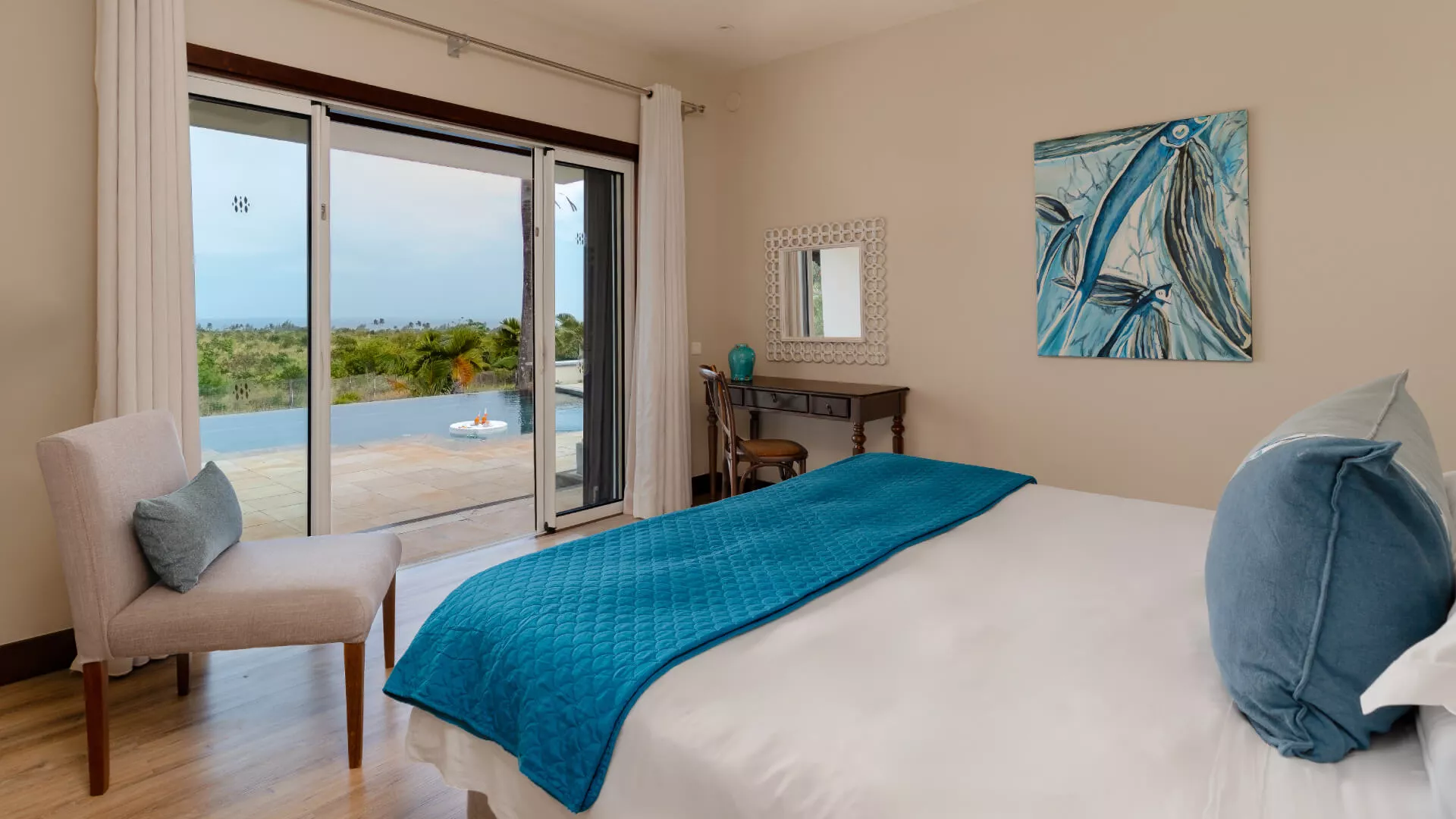 Luxury bedroom side view in a four-bedroom villa overlooking the swimming pool