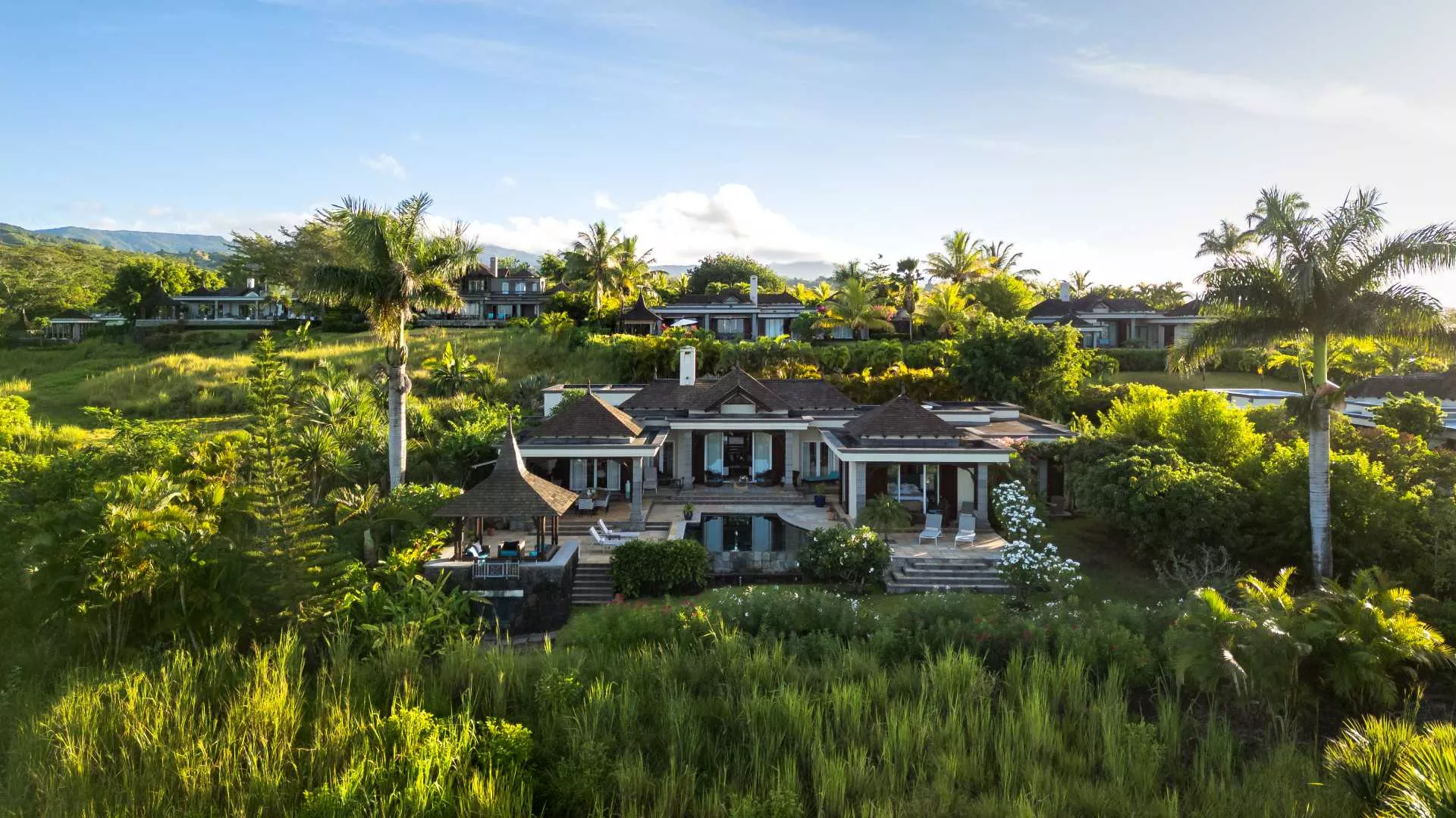 Main exterior landscape view of a luxury 4-bedroom villa