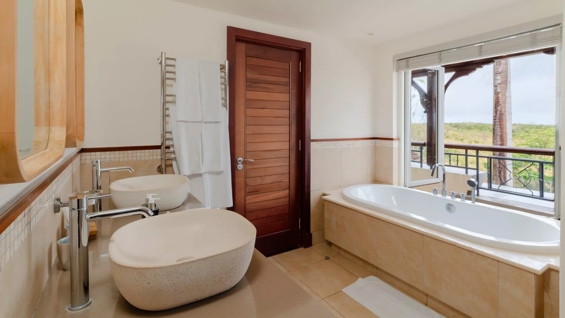 Interior view of a top floor bathroom in a luxury four-bedroom villa