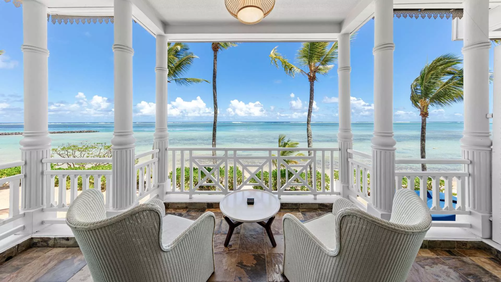 deluxe beachfront suite with private balcony giving ocean view at heritage le telfair