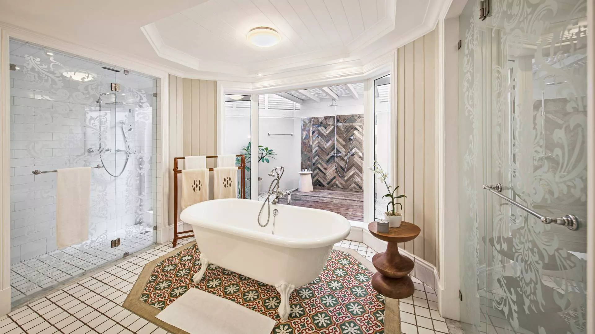 junior beachfront suite adult-only  with ground floor bathroom with an outdoor shower at heritage le telfair hotel mauritius