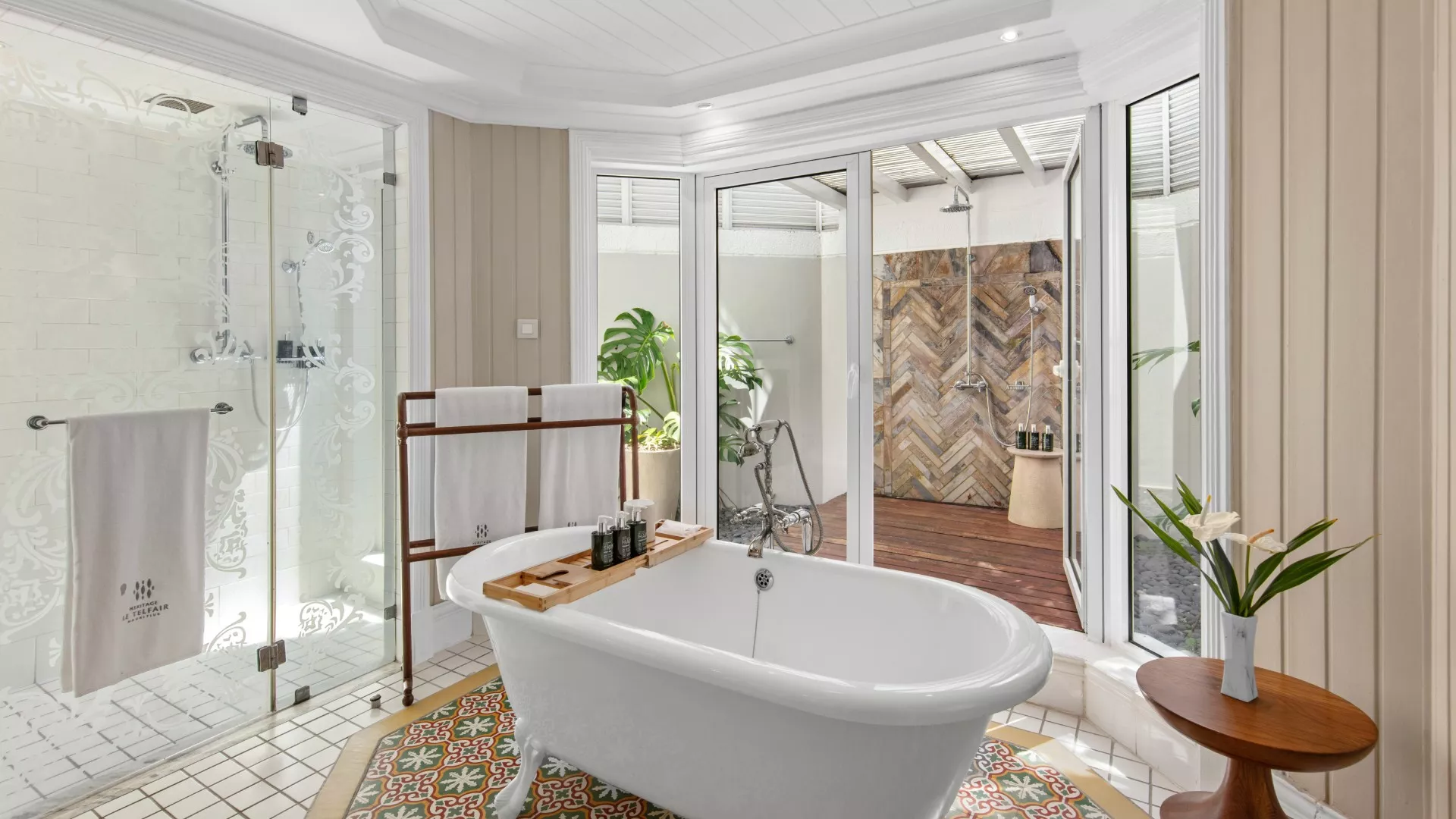 junior suite with garden view on ground floor with luxury style bathroom and outdoor showe