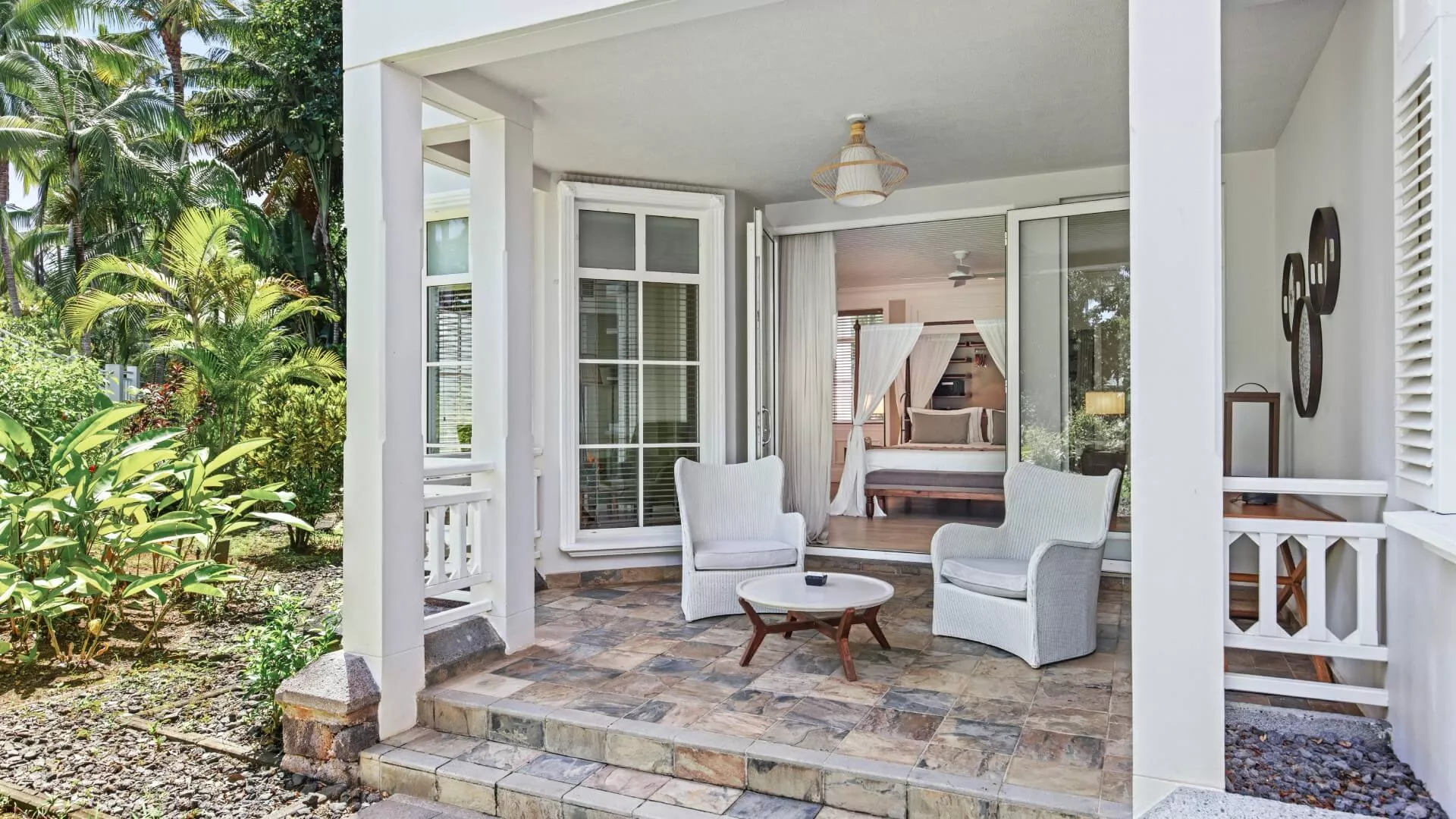junior suite garden view with private terrace opening onto the garden
