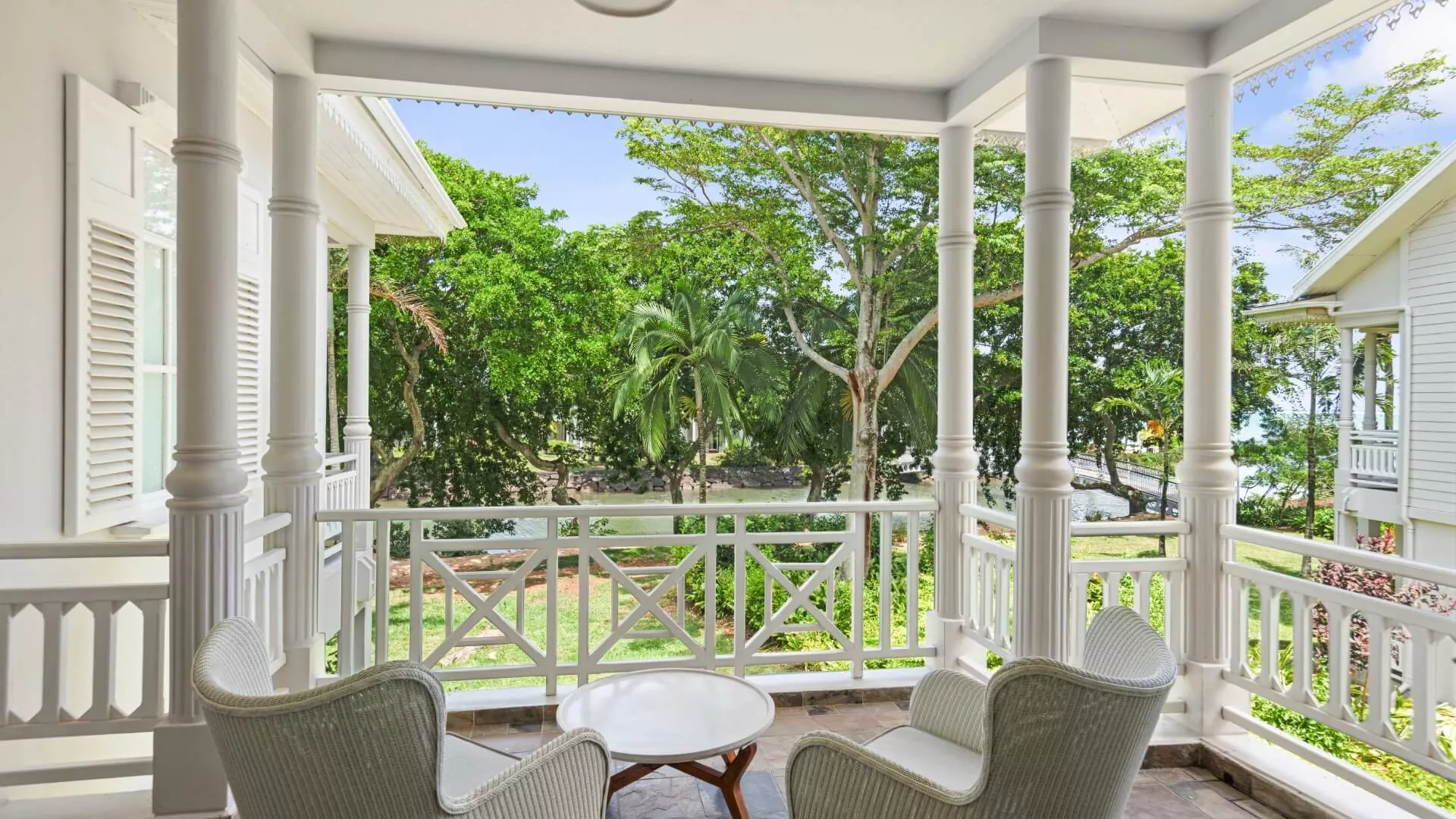 junior suite with garden view on upper floor with river facing balcony