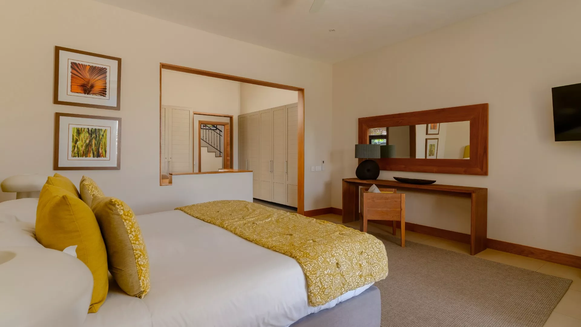 villa baume bedroom with king size bed and poolview at heritage the villas