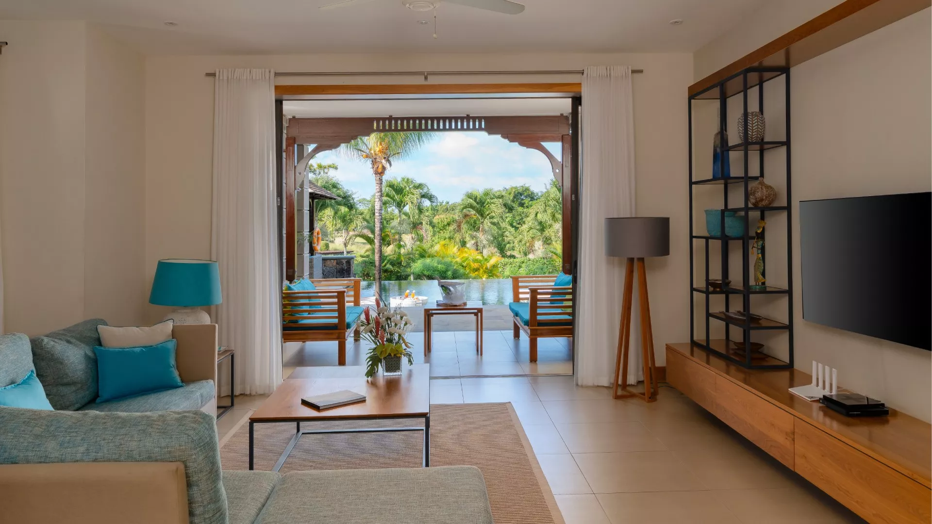 villa baume dining area with pool view 