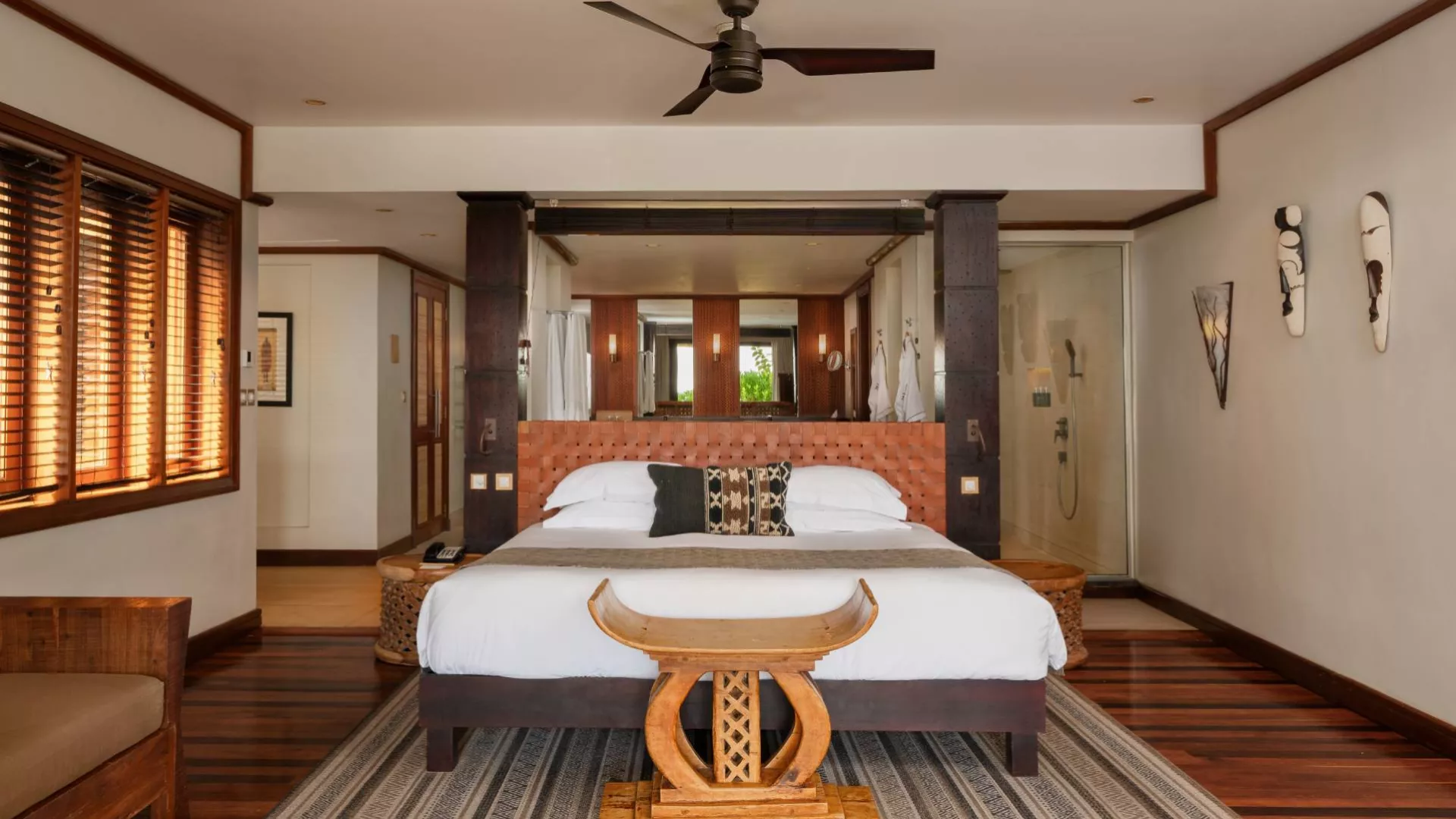 beachfront villa general view of bedroom with african inspired decor