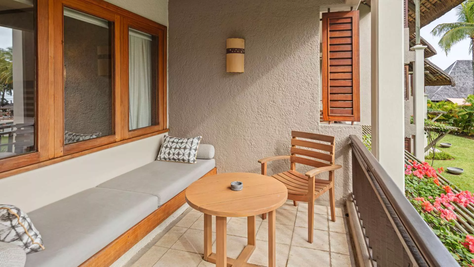 deluxe room overlooking tropical gardens with private balcony