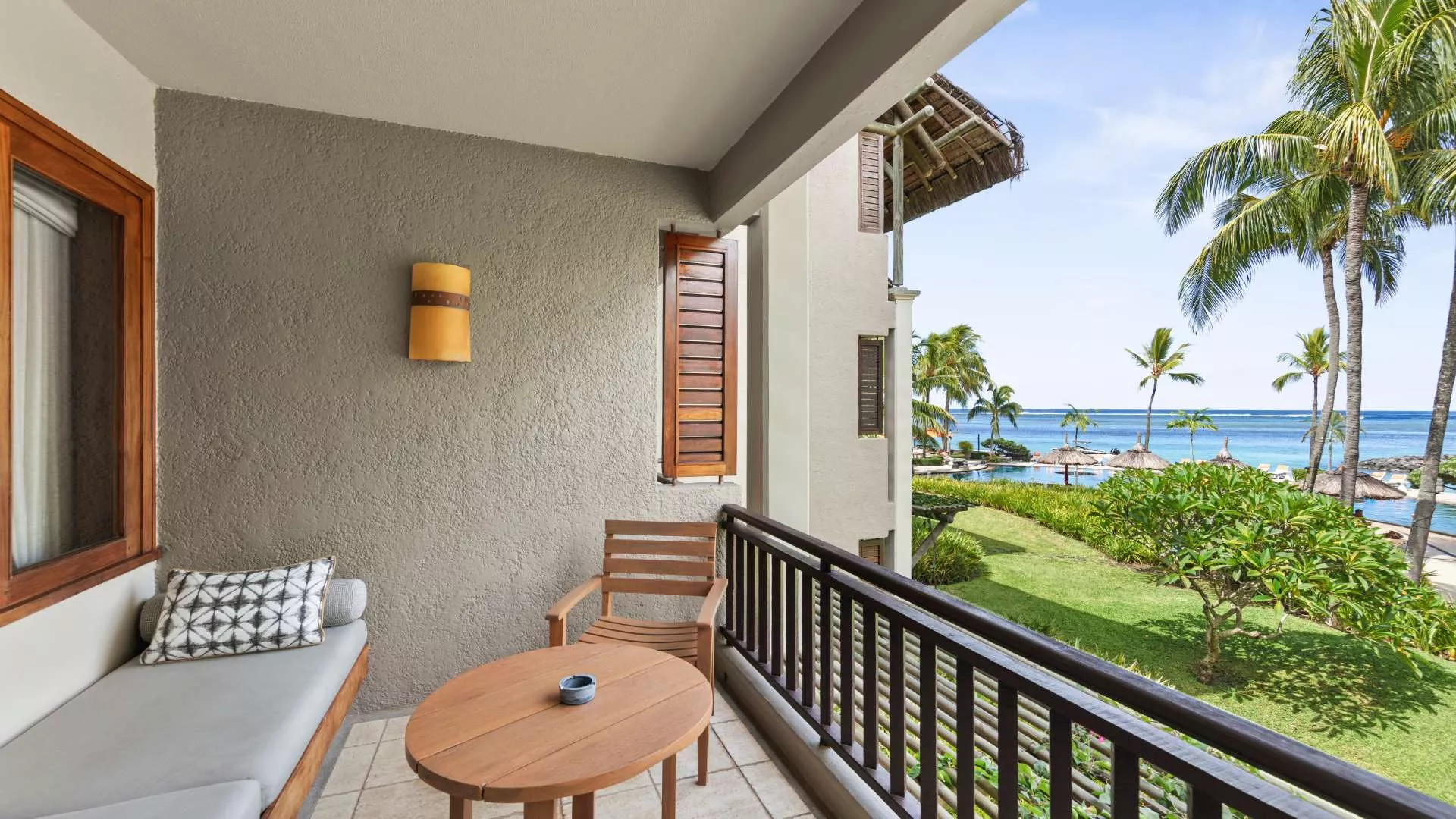 Deluxe sea view room with private balcony overlooking the ocean