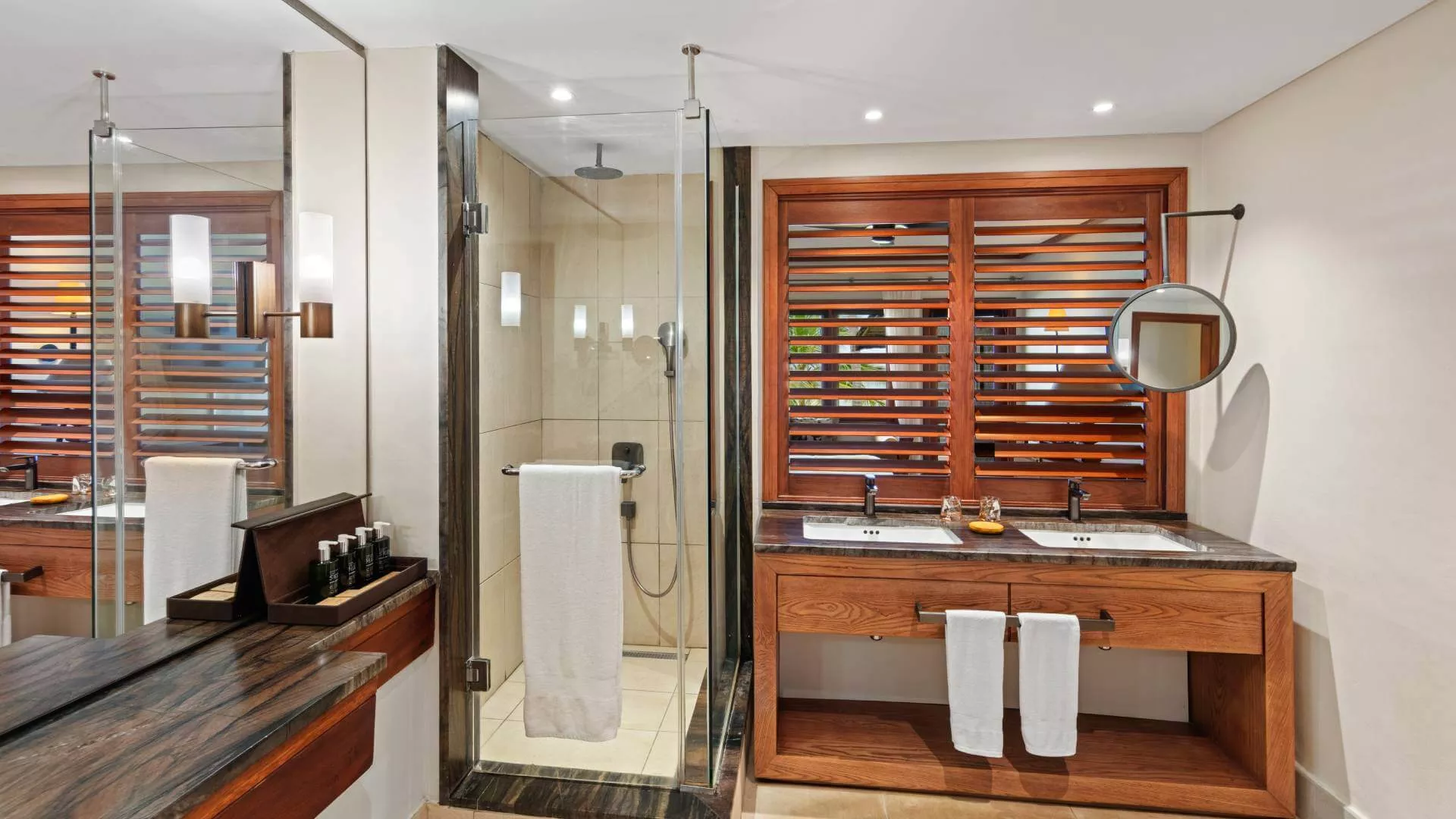 bathroom with amenities and african inspired decor on upper floor heritage awali