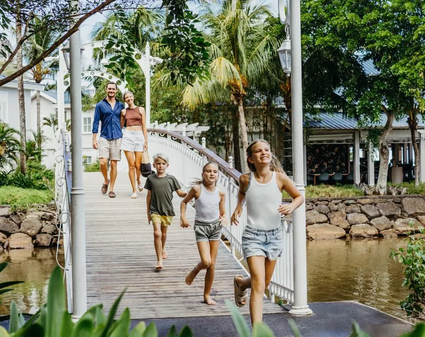 Family on a trip enjoying the amenities at Heritage Resorts in Mauritius