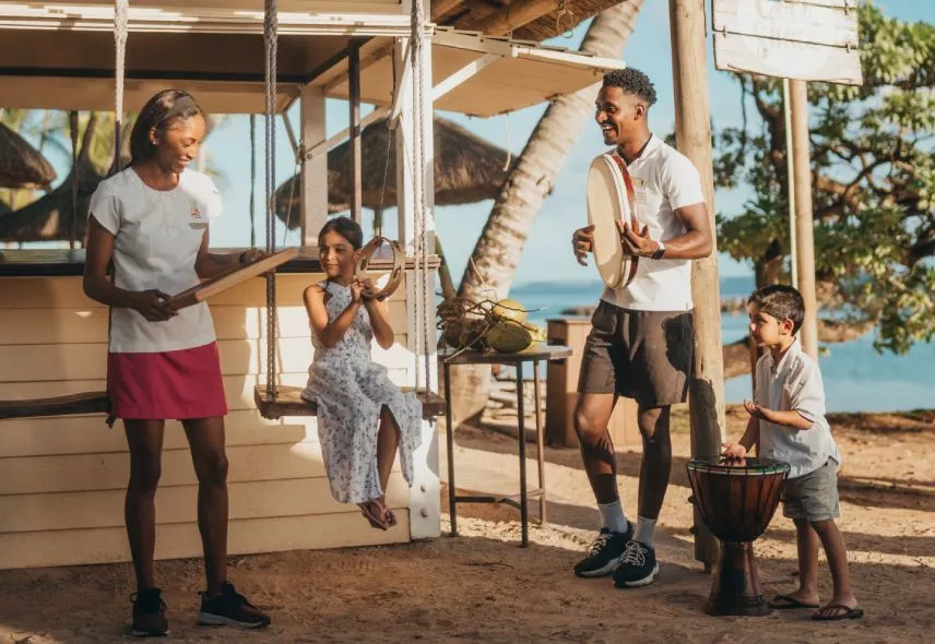Kids participating in fun beach music activities