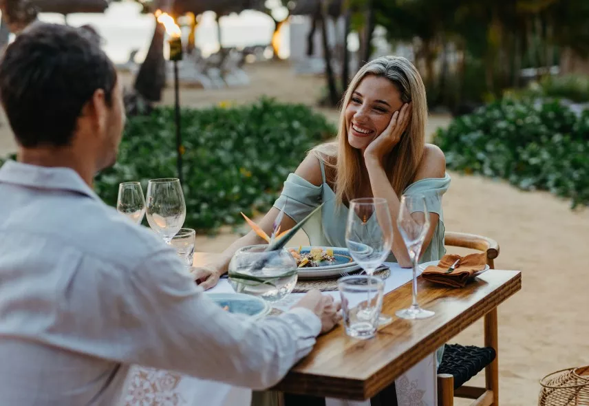 Couple enjoying a romantic evening together by the beach