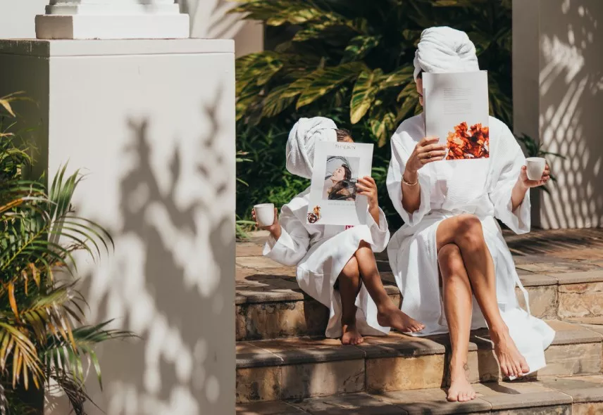 Mother and daughter enjoying a relaxing spa session together