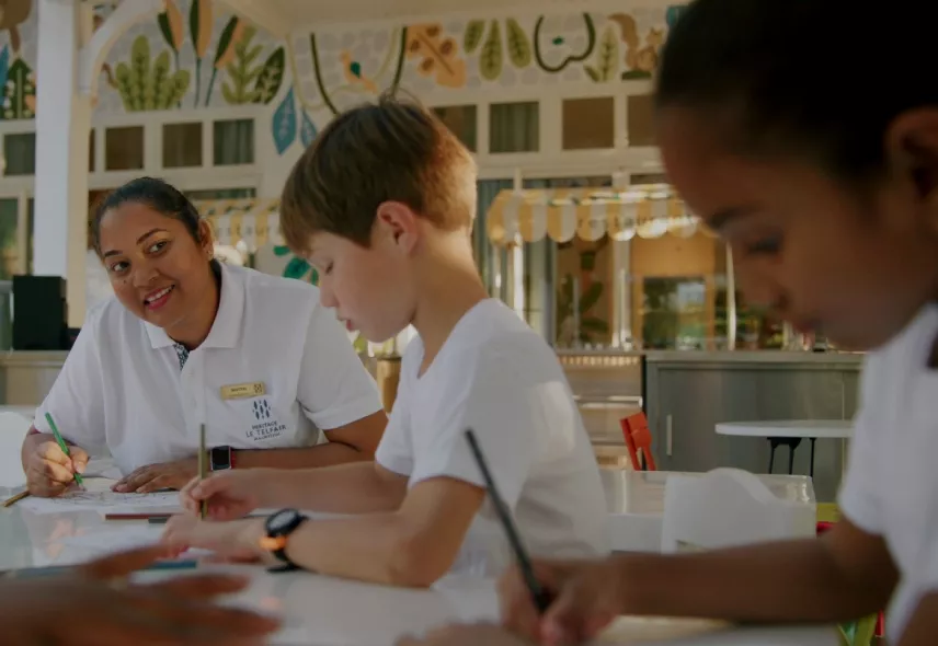 Children engaging in creative art activities inspired by local culture