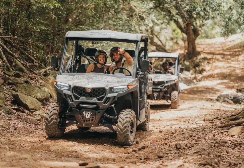 Couple enjoying buggy rides at Bel Ombre Nature Reserve, Mauritius