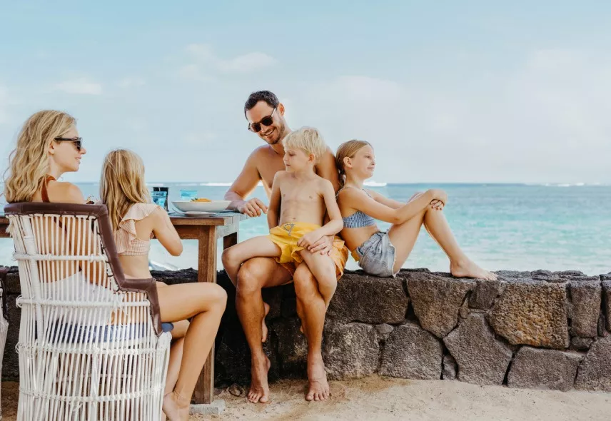 Relaxing family moment by the tranquil shores of Heritage Awali