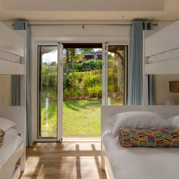 Ground floor bedroom in a 3 bedroom villa featuring two bunk beds positioned side by side for additional sleeping space