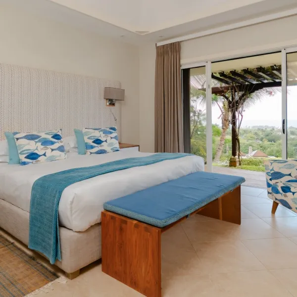 Side view of a bedroom in a luxury 4-bedroom villa with exterior view