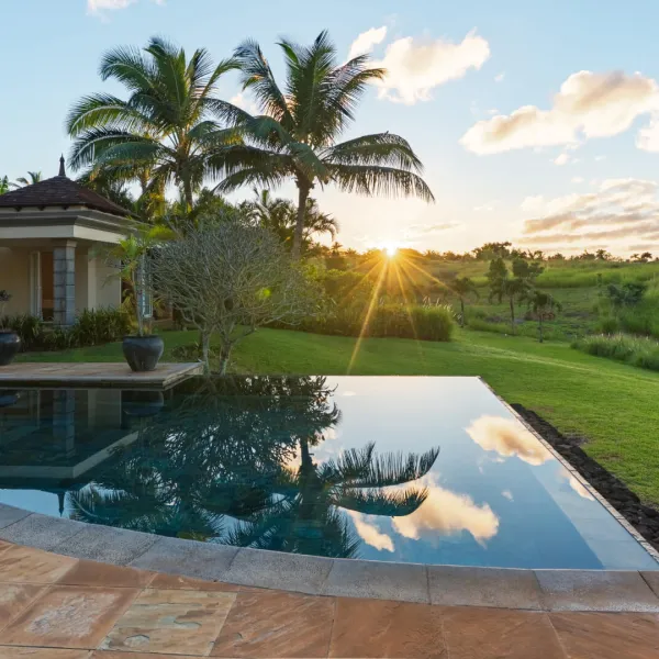 Exterior View over a four bedroom villa during sunset