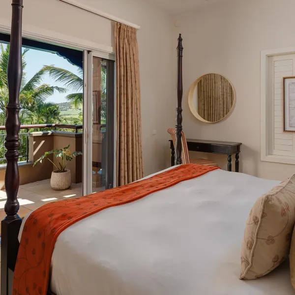 Bedroom 2 in a three-bedroom villa with private pool and ocean view at Heritage the Villas, Mauritius