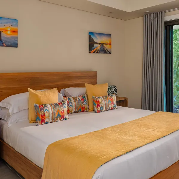 Bedroom of a 4-bedroom villa with pool view at Heritage The Villas, Mauritius