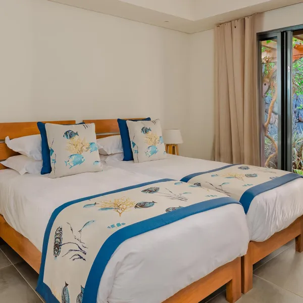 Fourth bedroom of a 4-bedroom villa with pool view at Heritage The Villas, Mauritius