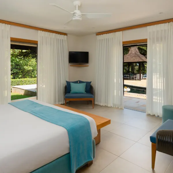 Bedroom in a luxury 3-bedroom villa with outdoor view