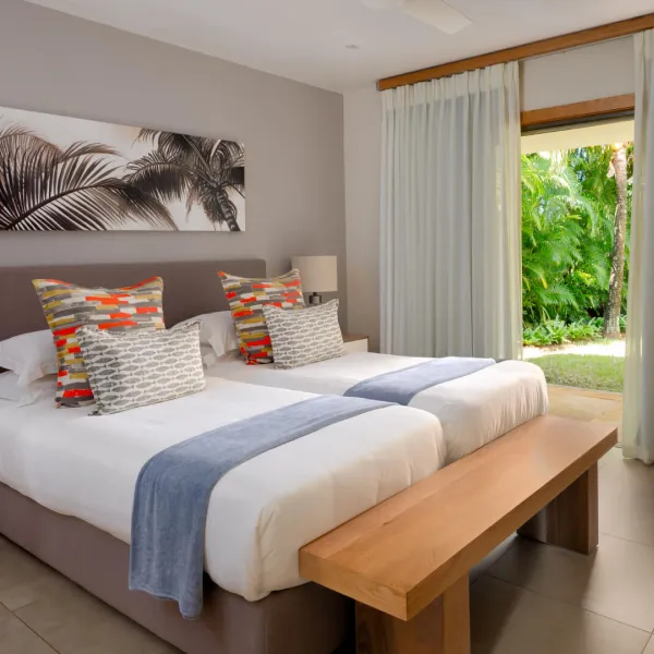Side view of a paired bedroom in a luxury three-bedroom villa