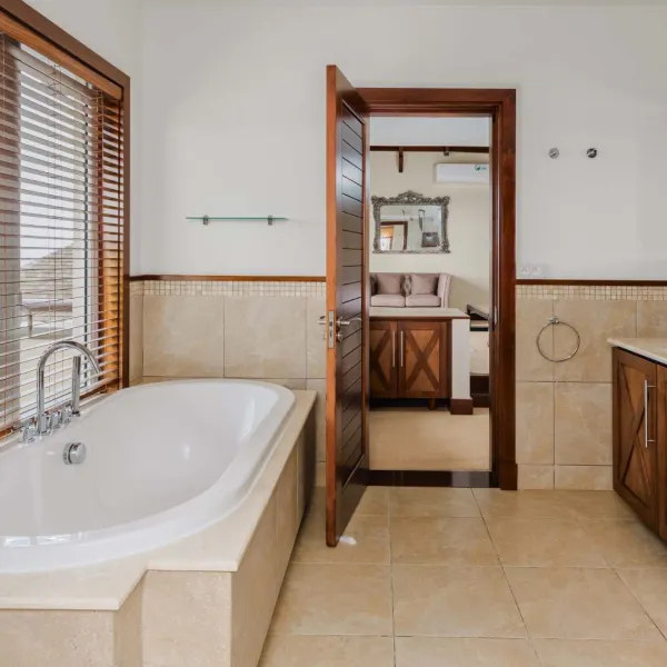 Side-angle interior view of a bathroom in a luxury four-bedroom villa with modern fittings
