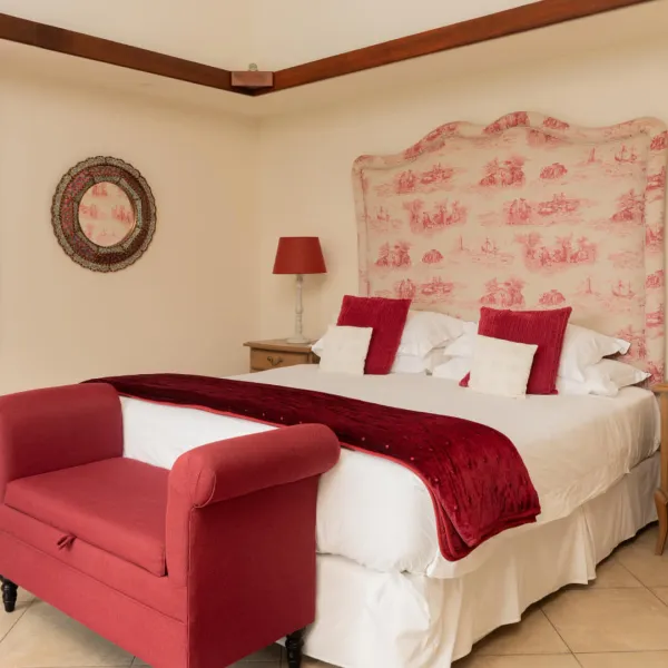 Front view of a bedroom with bed bench in a luxury 4-bedroom villa