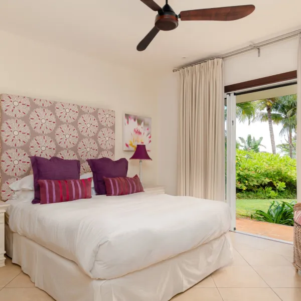 Left side exterior view of a bedroom in a luxury 4-bedroom villa