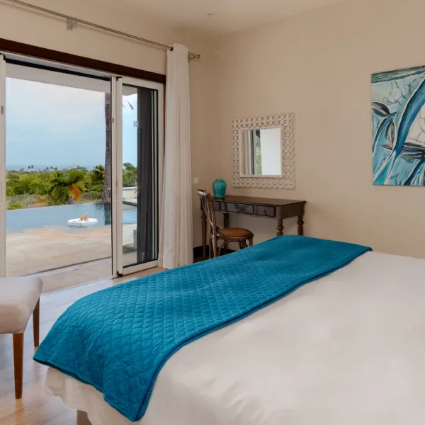 Luxury bedroom side view in a four-bedroom villa overlooking the swimming pool