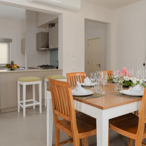 Overview of the dining area with tables in a luxury 4-bedroom villa