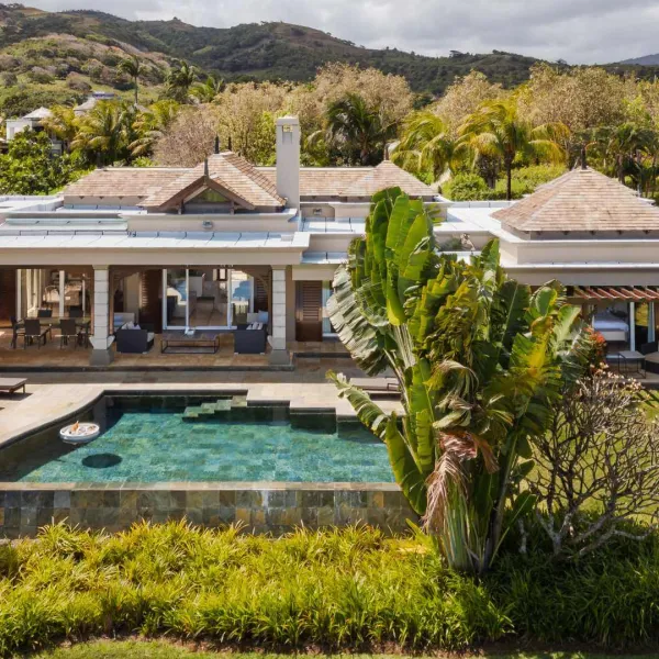 Front exterior view of a luxury 4-bedroom villa