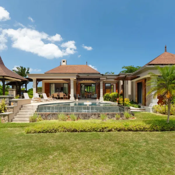 Front exterior view of a luxury 4-bedroom villa
