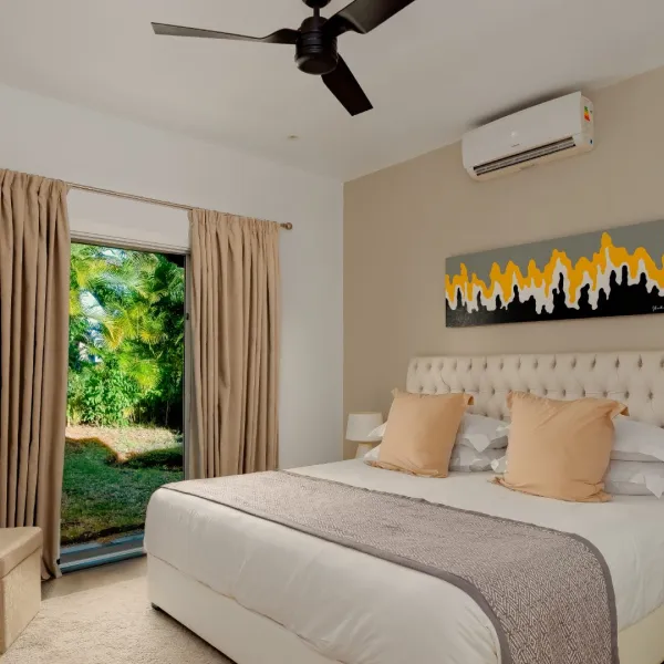 Ground floor right-side bedroom with an exterior view