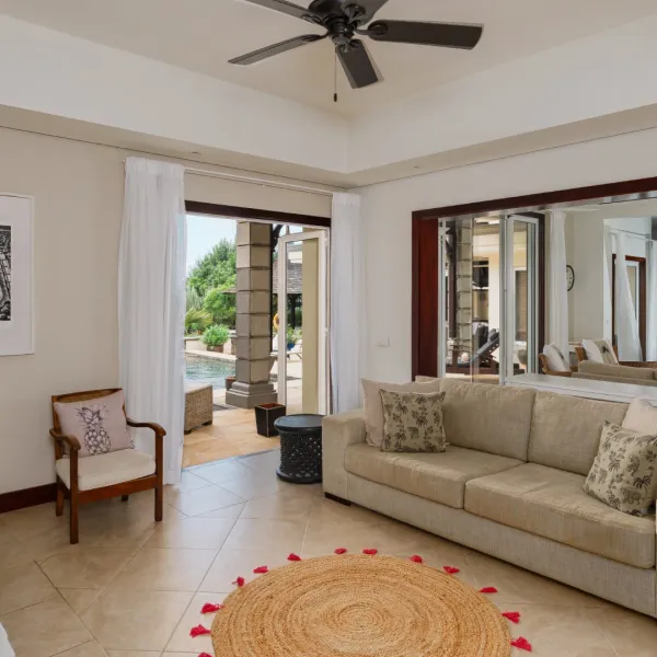 Side-angle view of the living room in a luxury four-bedroom villa