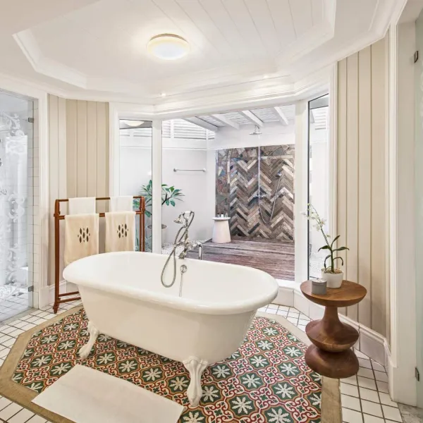 junior beachfront suite adult-only  with ground floor bathroom with an outdoor shower at heritage le telfair hotel mauritius